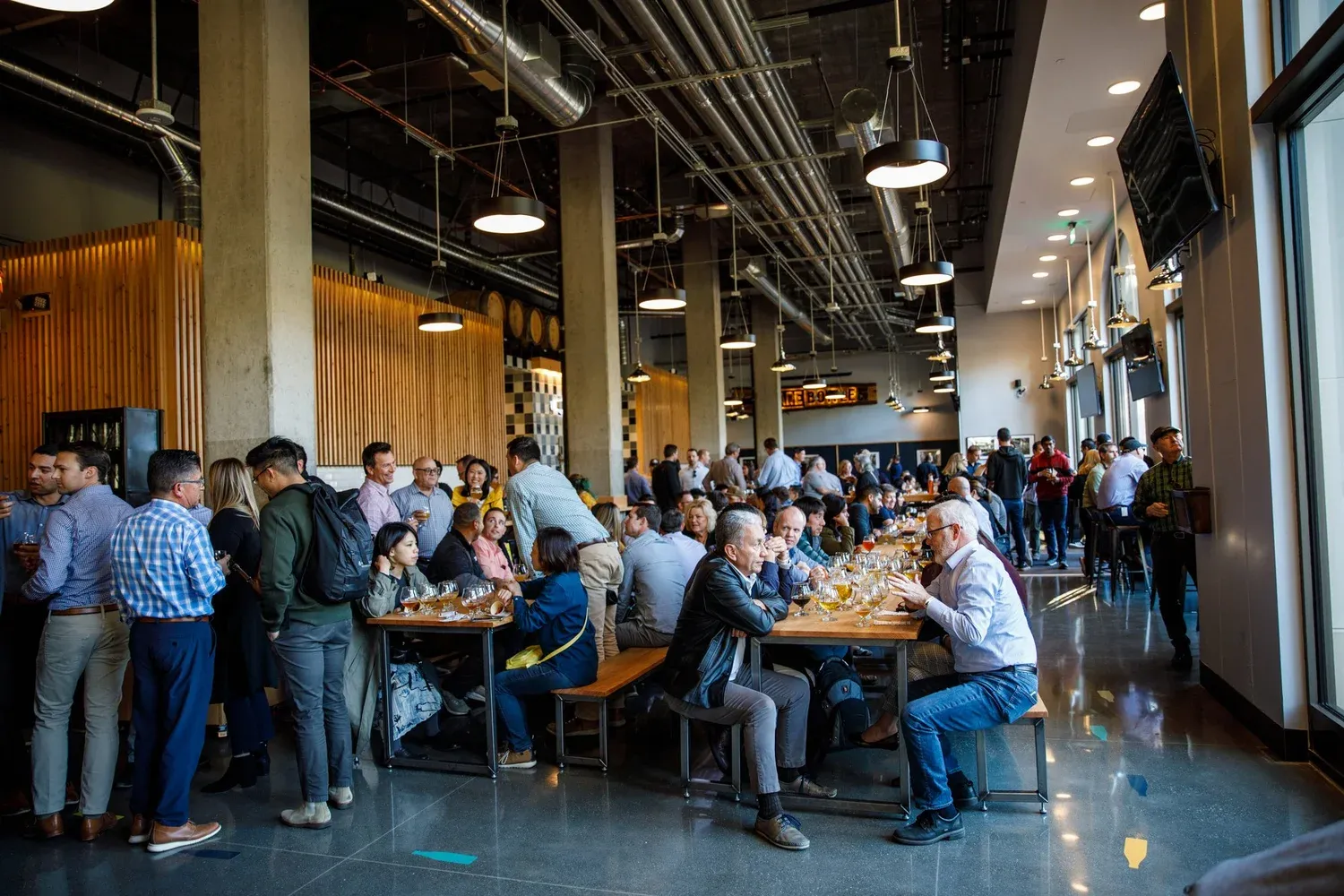 The Barebottle Santa Clara taproom packed with people on a busy weekend.